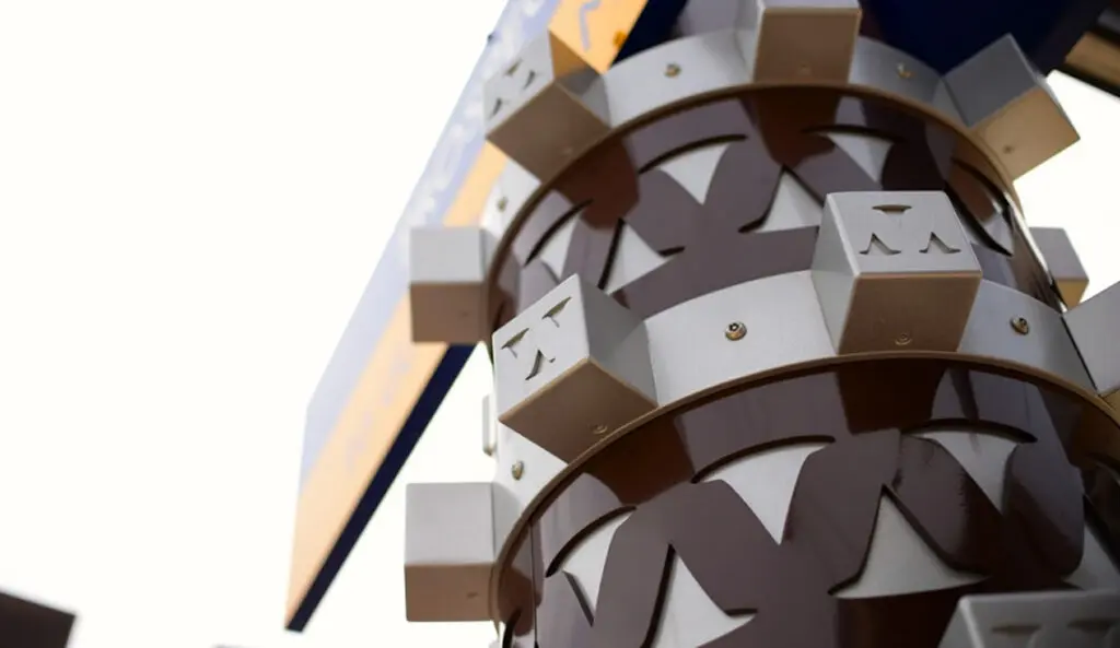 Unique metallic design with cutout patterns