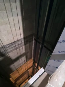 Deep elevator shaft with concrete walls
